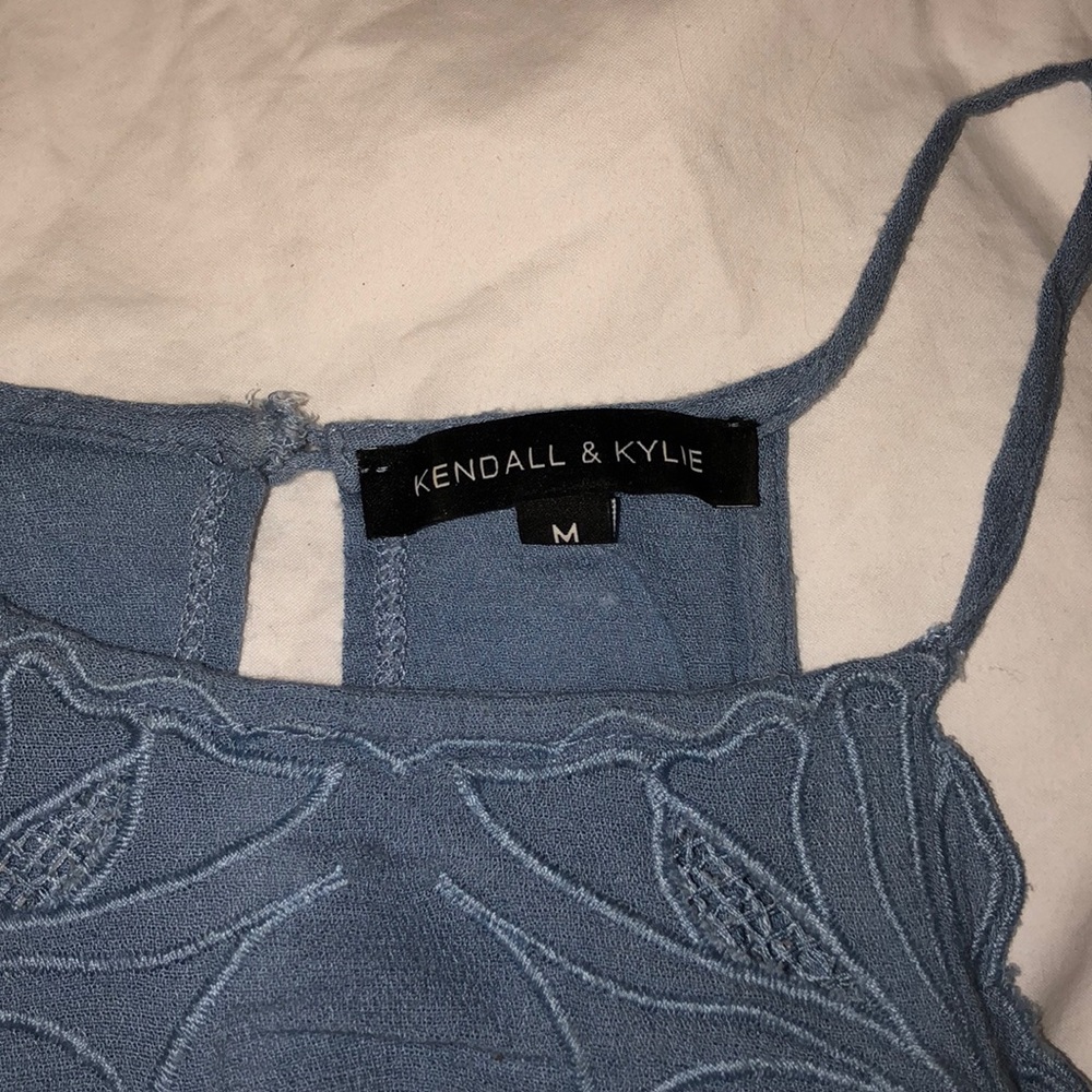 Light blue blouse.